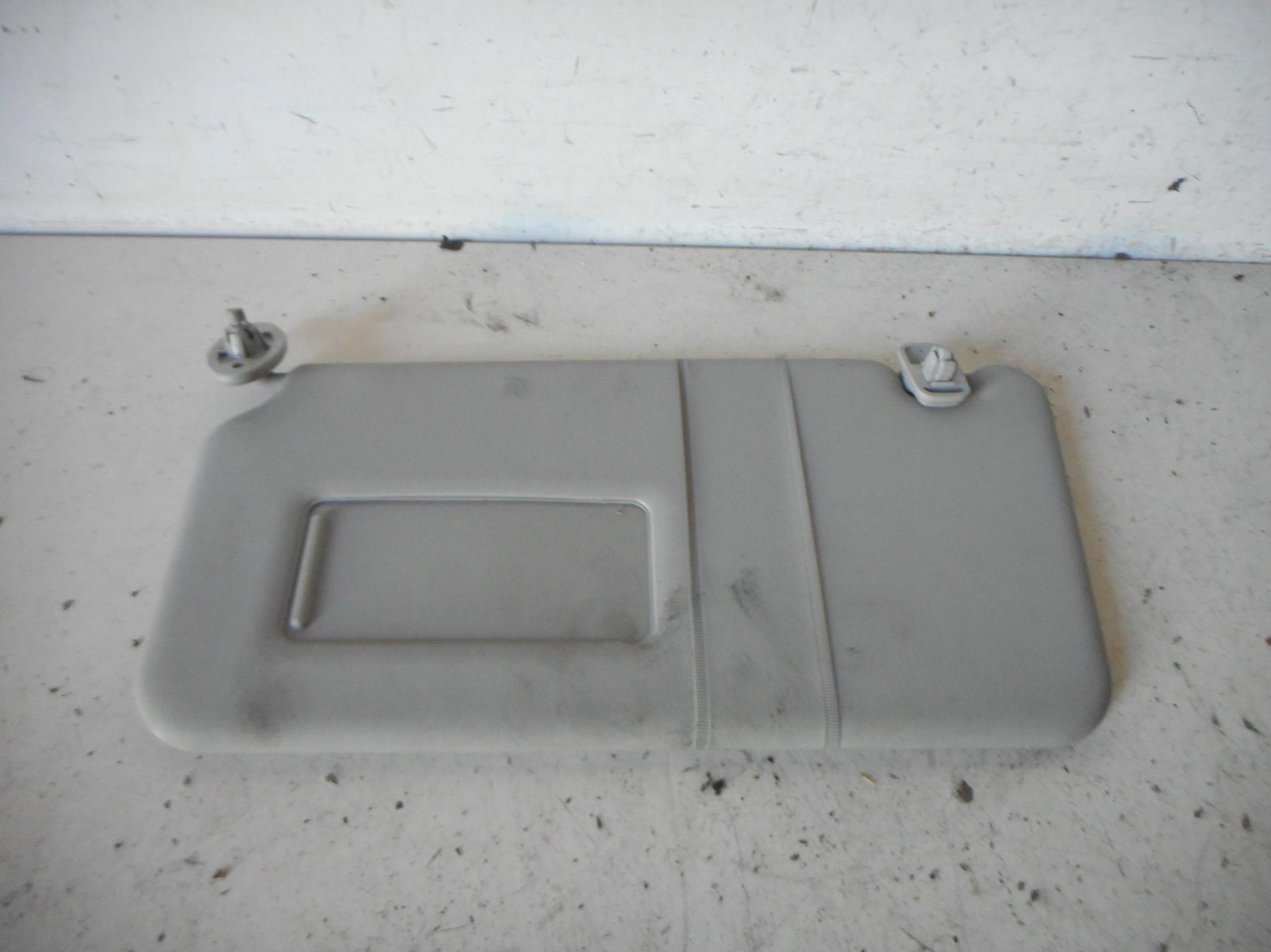 Aletta parasole parabrezza sx.